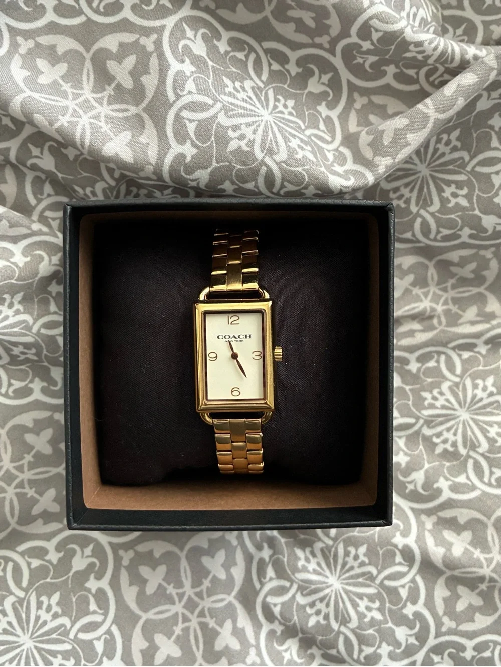 Coach gold watch